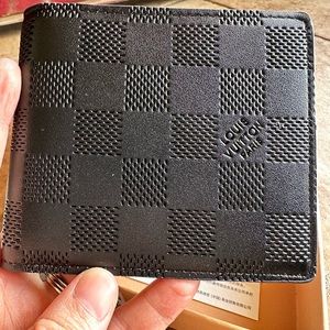 LV Slender Grid embossed wallet